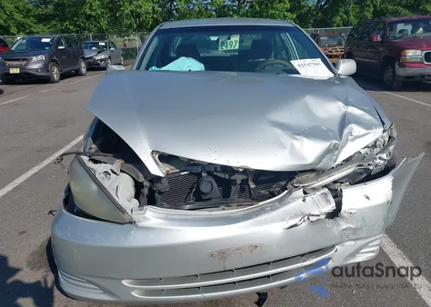 2002 Toyota Camry Le from USA, damaged, VIN 4T1BE32K22U530911